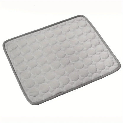 Gray CoolNest quilted cat cooling mat on a white background