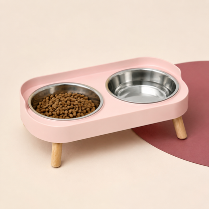 ComfortDine elevated pink double bowl feeding station with food and water