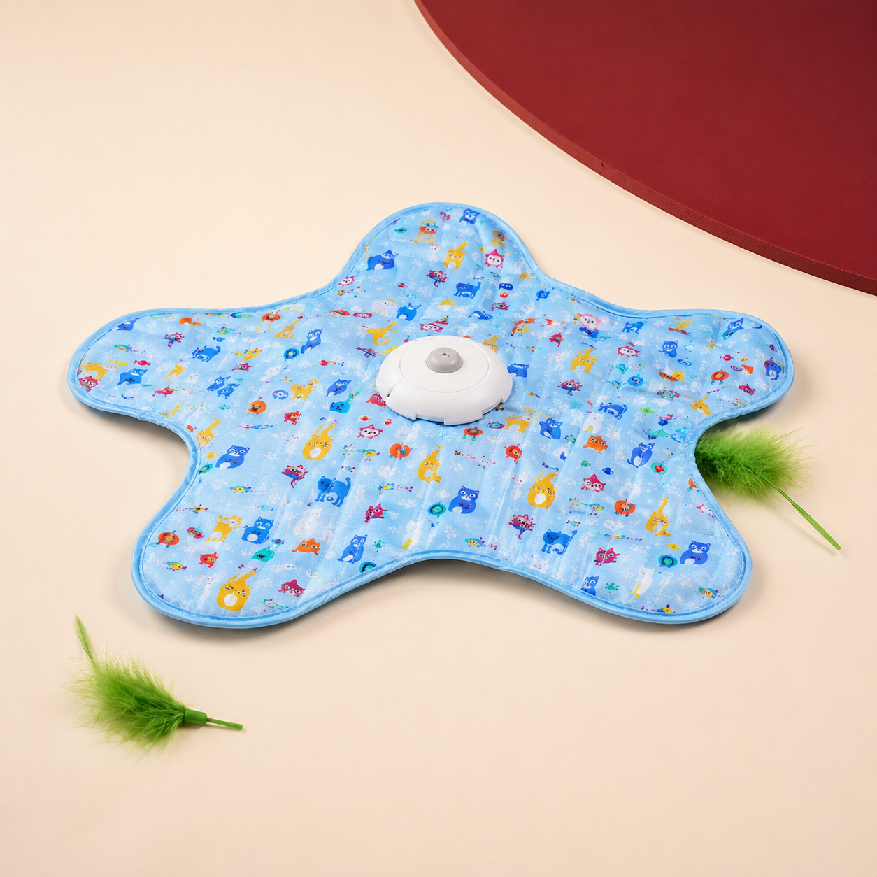 PeekyPounce hidden-motion cat toy with blue star mat and green feather tails