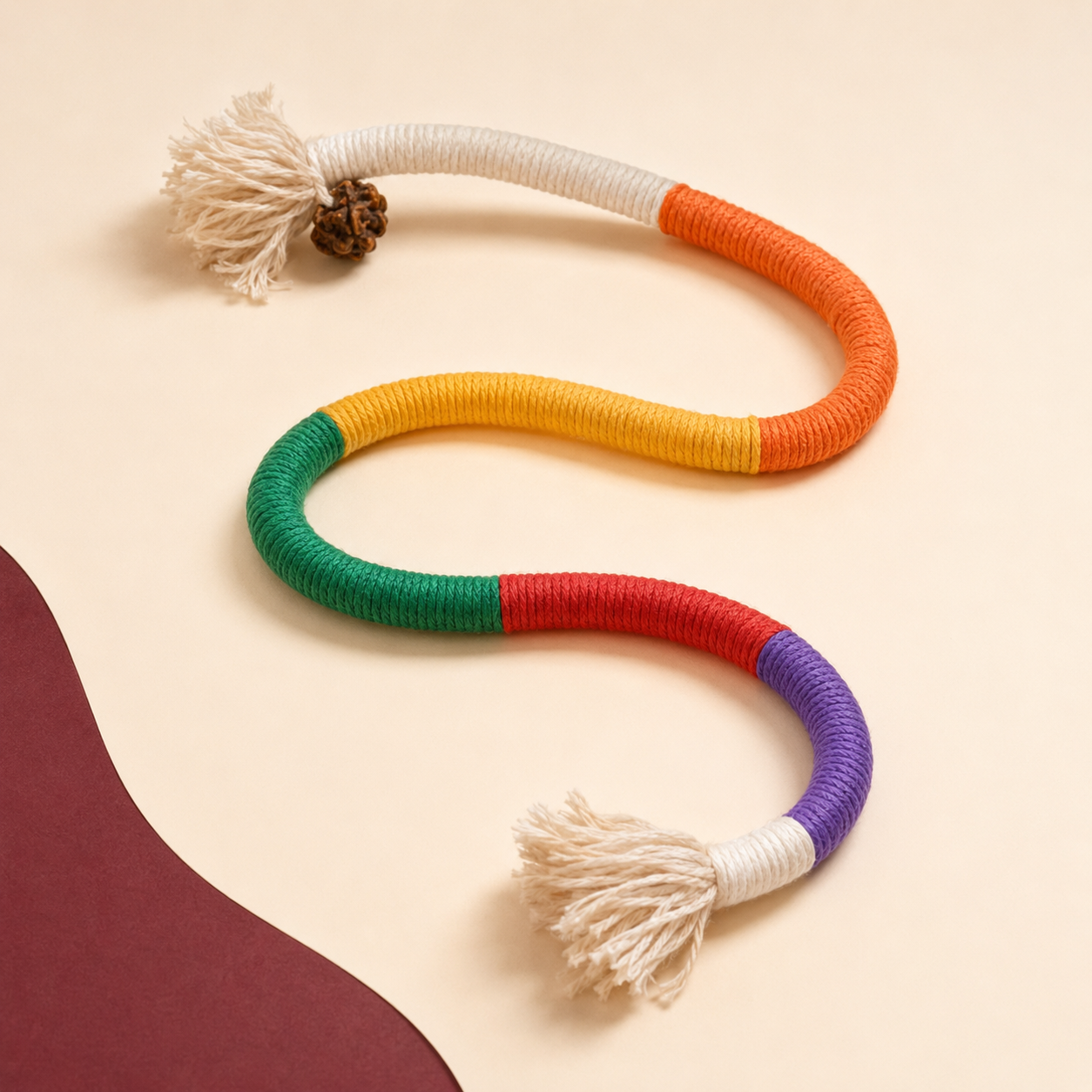 Single Silvervine Loop rope cat toy with multicolor cotton sections and tassel ends